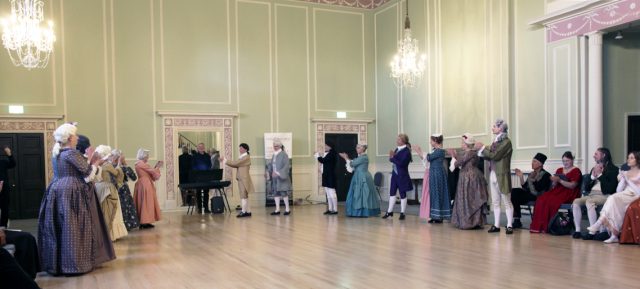 NHD Dancers applaud the two musicians, Harriet on violin and Stephen on keyboard.